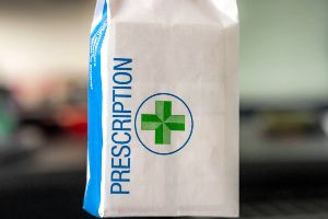 prescription bag with green cross