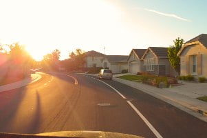 sunset on neighborhood road