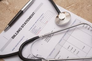 medical billing statement with stethoscope