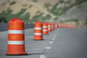 Orange barrels set up for road construction 