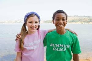 kids wearing summer camp shirts