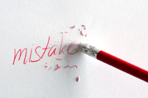mistake in red pencil being erased
