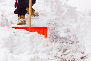 walking while shoveling snow