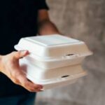 Current image: Man Holding Foam Lunch Containers Blog