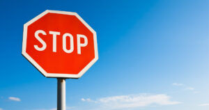 Who May Be Liable if Running a Stop Sign Leads to a Crash in Minnesota?