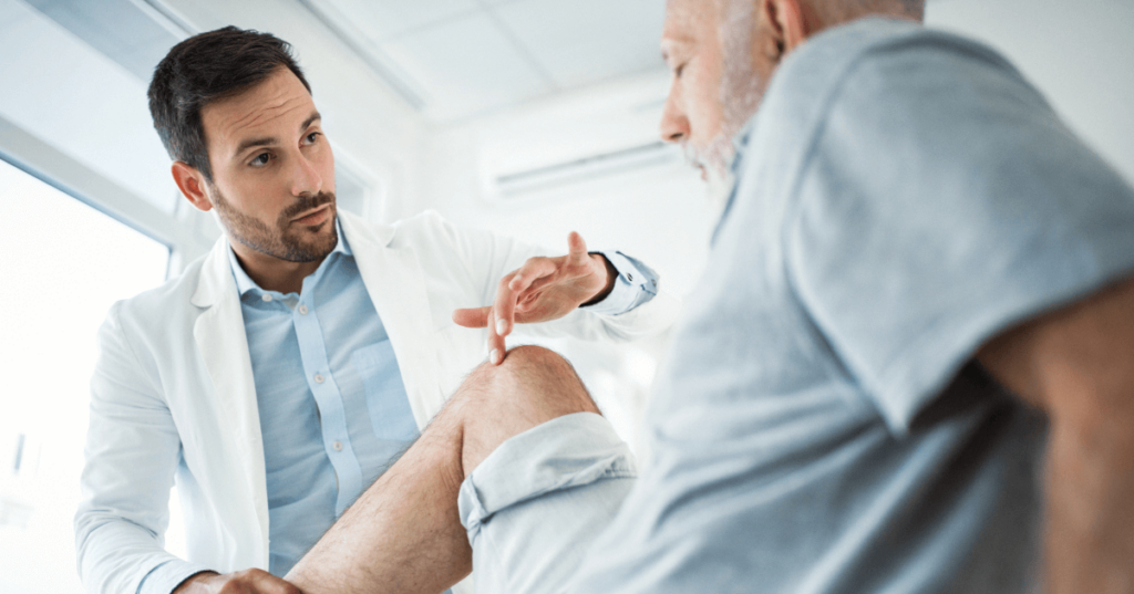 Current image: |doctor examining patient's knee
