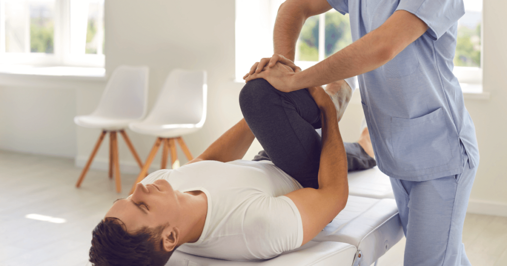 Current image: doctor helping patient stretch legs social|helping patient bend knee