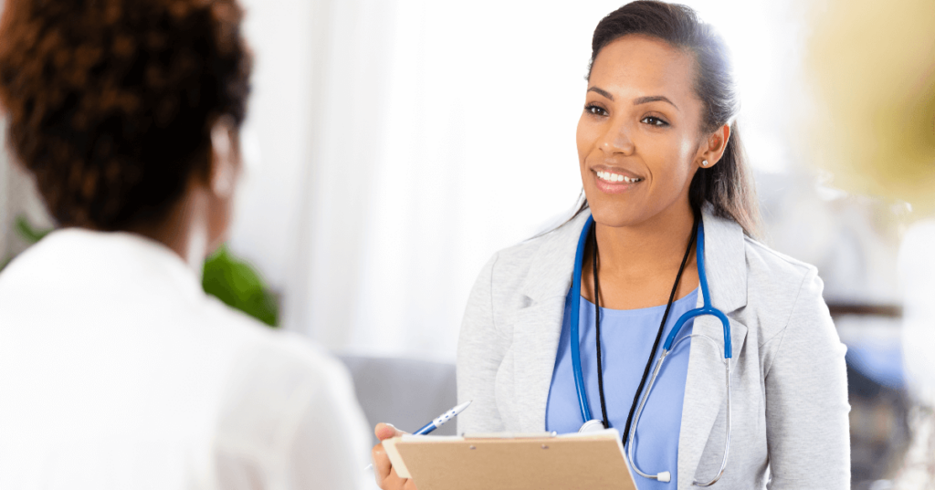 Current image: Doctor Talking to Patient About Symptoms Social