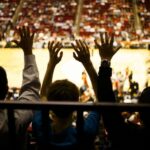 Current image: Fans at Basketball Arena Social