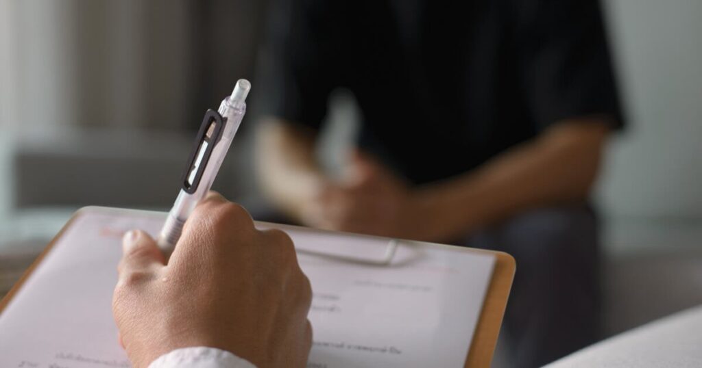 Current image: psychologist doing assessment of patient