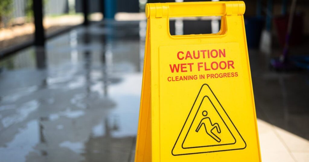 Current image: yellow sign warning of wet floor