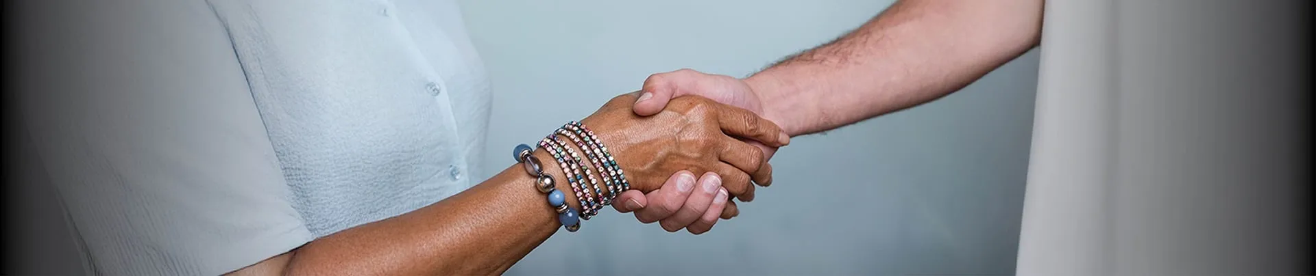 Attorney and client shaking hands